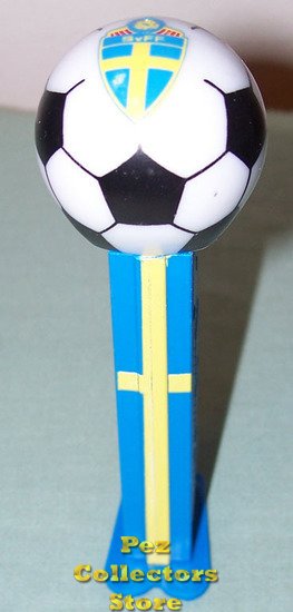 (image for) Swedish Soccer Ball Pez on Blue Stem with Yellow Cross - Click Image to Close
