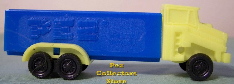 (image for) D Series Truck R2 Yellow Cab on Blue Trailer Pez - Click Image to Close