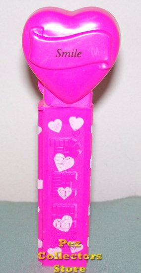 (image for) 2005 Smile Heart Pez Neon Pink printed stem Loose - Click Image to Close