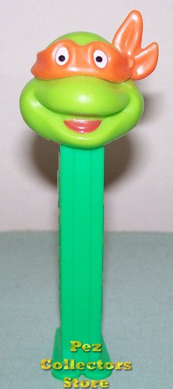 (image for) TMNT Happy Michaelangelo Orange mask on Green Stem Pez - Click Image to Close