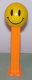 (image for) Walmart Smiley Funky Face Pez on Orange Stem