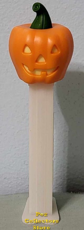 (image for) 2012 Halloween Flat Top Pumpkin Pez GITD Stem Loose