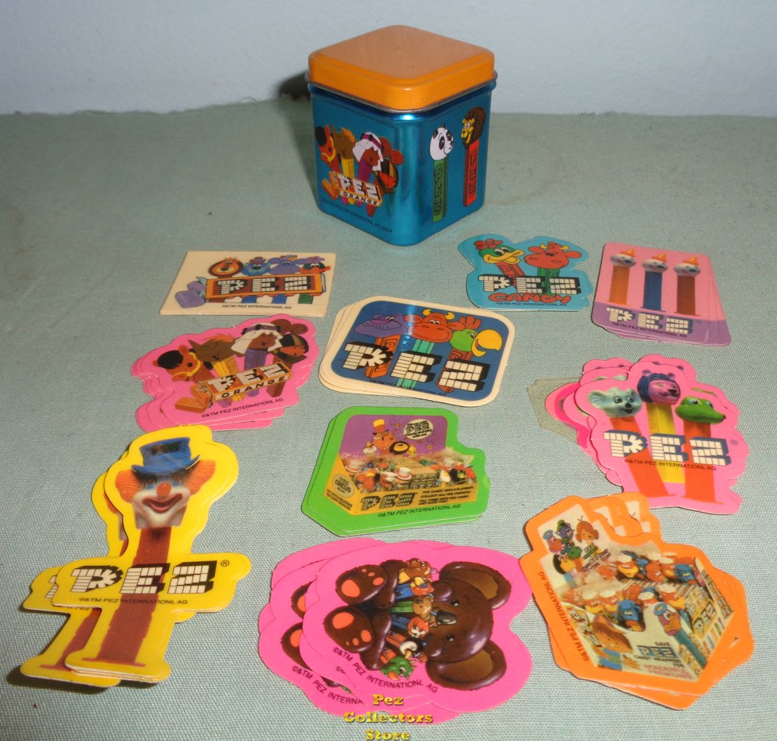 (image for) Japanese Blue and Orange Mini Tin with Pez Circus Ad Stickers