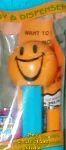 Big Grin Funky Face Pez on Blue Stem MIP