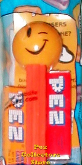 (image for) Wink Funky Face Pez on Orange Stem MIP