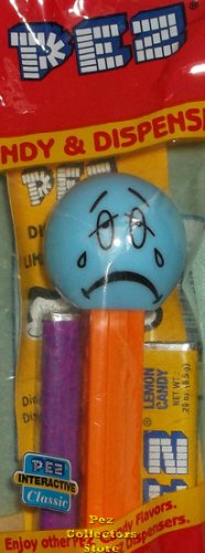 (image for) Sad Funky Face Pez on Orange Stem MIP