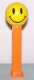 (image for) Smiley Funky Face Pez on Orange Stem Loose