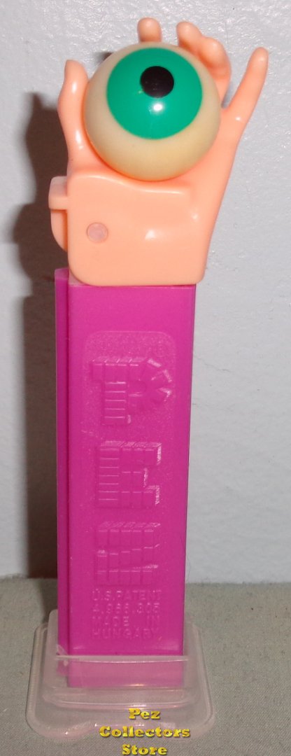 (image for) Psychedelic Eye Pez Flesh Hand Green Eye on Purple Stem