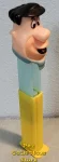 Fred Flintstone Pez with Spearmint Blue Sleeve and Button oose (image for) Fred Flintstone Pez with Spearmint Blue Sleeve and Button oose