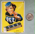 (image for) Pez Girl with Regular and Peppermint Pez Candy Pack 3" x 4" Tin Postcard Sign