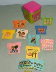 Japanese Green and Pink Mini Tin with Pez T-Shirt Ad Stickers (image for) Japanese Green and Pink Mini Tin with Pez T-Shirt Ad Stickers