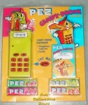 Neon Yellow Electronic Pez Telephone and Phone Registry!