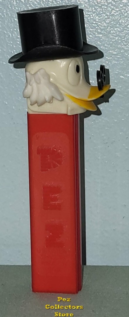 Modal Additional Images for Vintage Scrooge A Pez Movable Wings Red 3.8 USA No Feet Stem