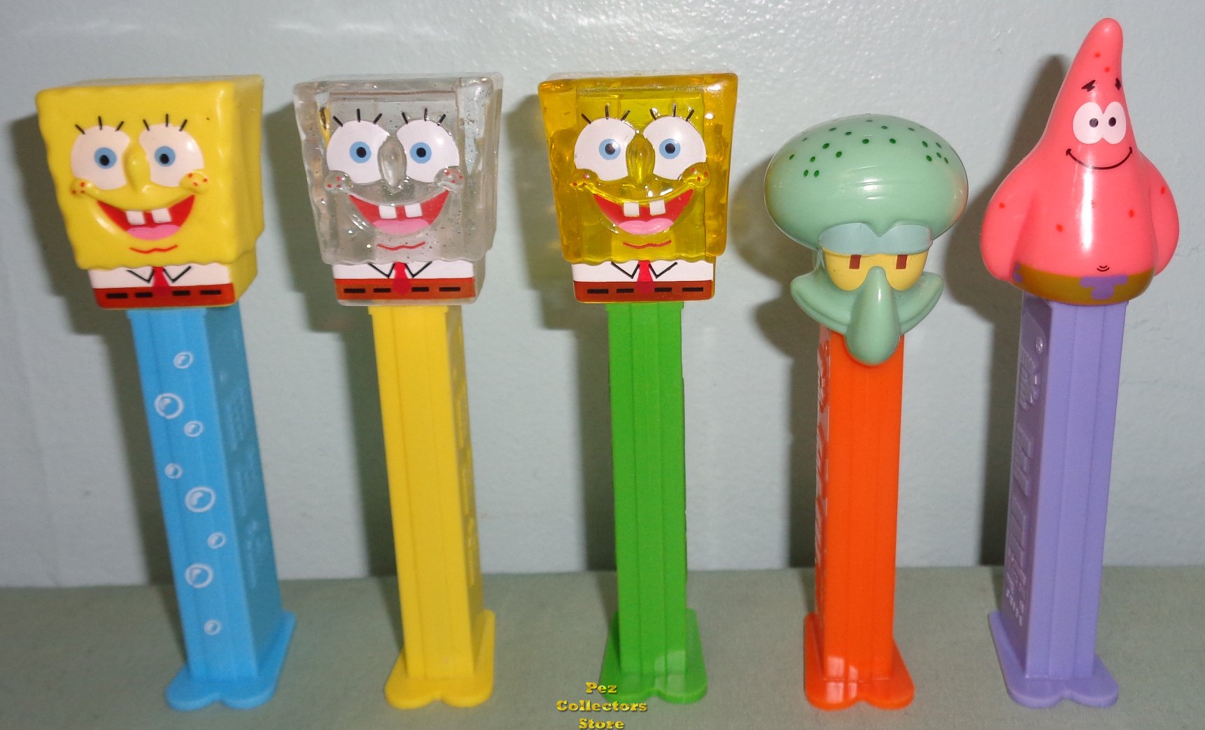 (image for) SpongeBob Bubbles, Glitter, Crystal, Pat & Squidward Pez Loose - Click Image to Close