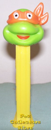 (image for) TMNT Happy Michaelangelo Orange mask on Yellow Stem Pez - Click Image to Close